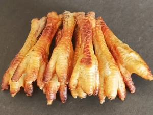 Cooked chicken feet for dogs from Hungry Eyes - fresh dog food delivery, Bangalore. They're natural collagen dog chews.