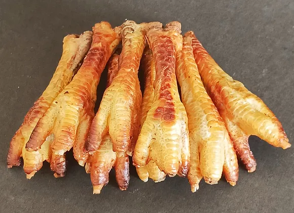 Cooked chicken feet for dogs from Hungry Eyes - fresh dog food delivery, Bangalore. They're natural collagen dog chews.
